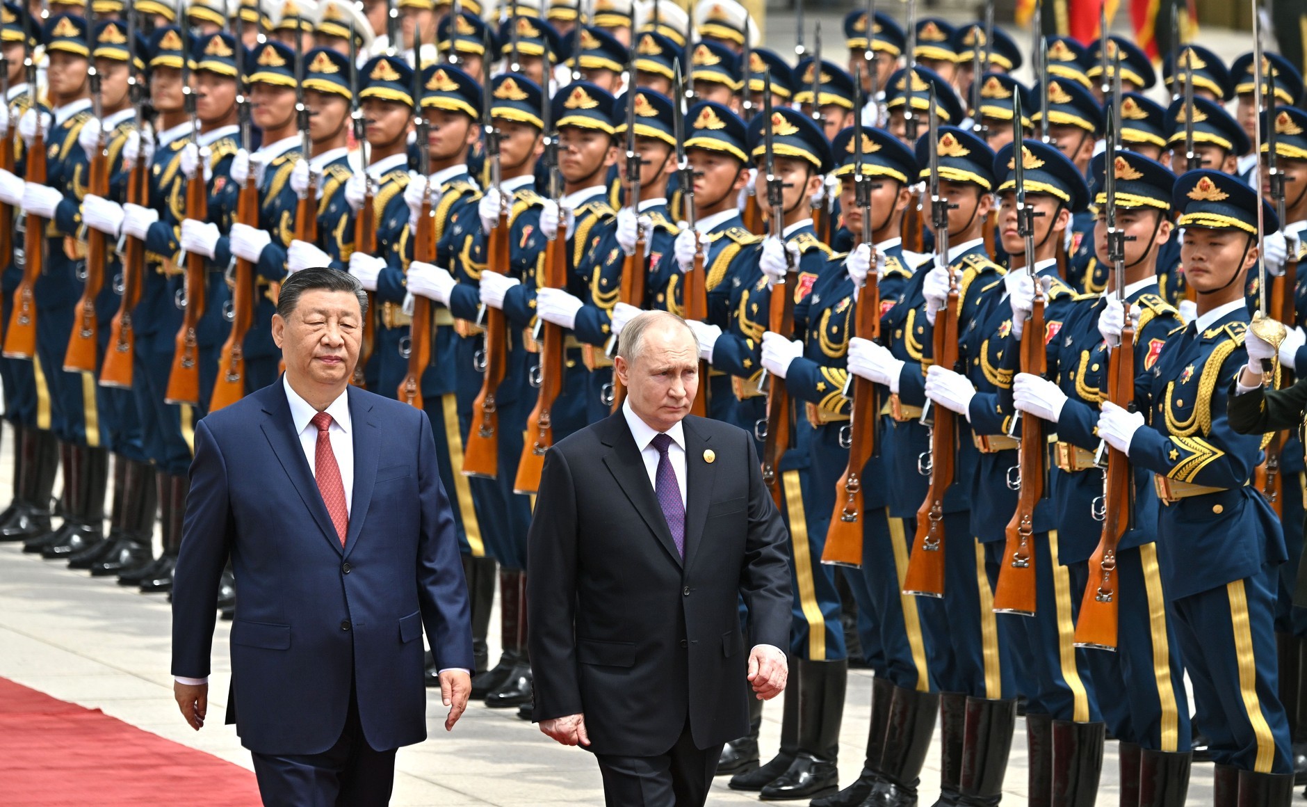 Putin şi Xi promit o nouă eră şi înfierează Statele Unite ale Americii. Totuşi, în delegaţia rusă a fost o absenţă notabilă: şeful Gazprom – FOTO